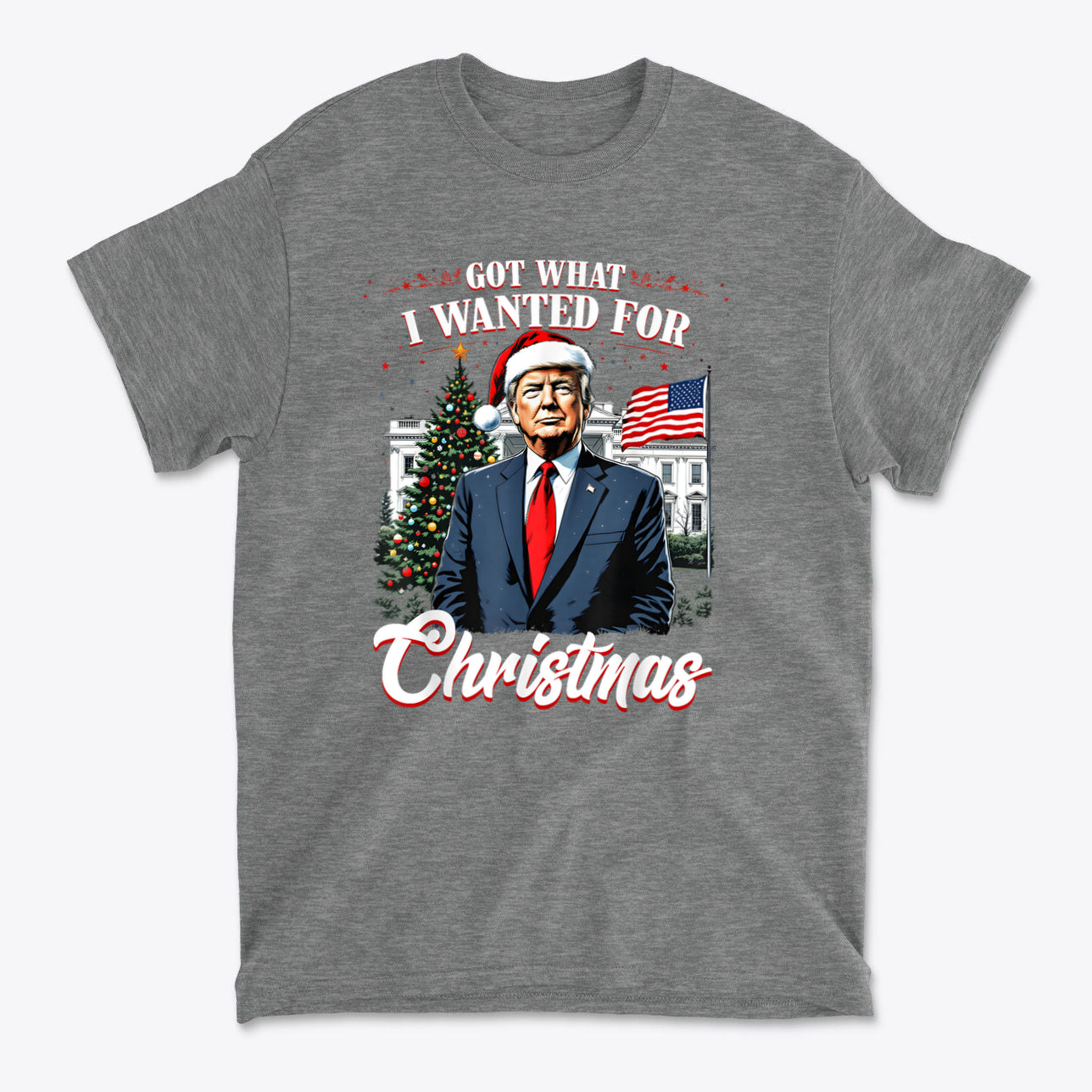 I Got What I Wanted For Christmas graphic t-shirt featuring a man in a suit with a Santa hat and Christmas tree.