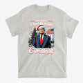I Got What I Wanted For Christmas graphic t-shirt featuring a festive design with a character in a Santa hat.