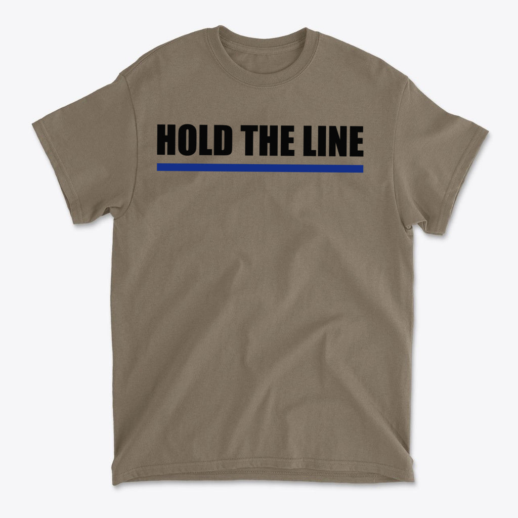 Hold The Line Black Letters T Shirt with bold text and blue accent on a tan background.
