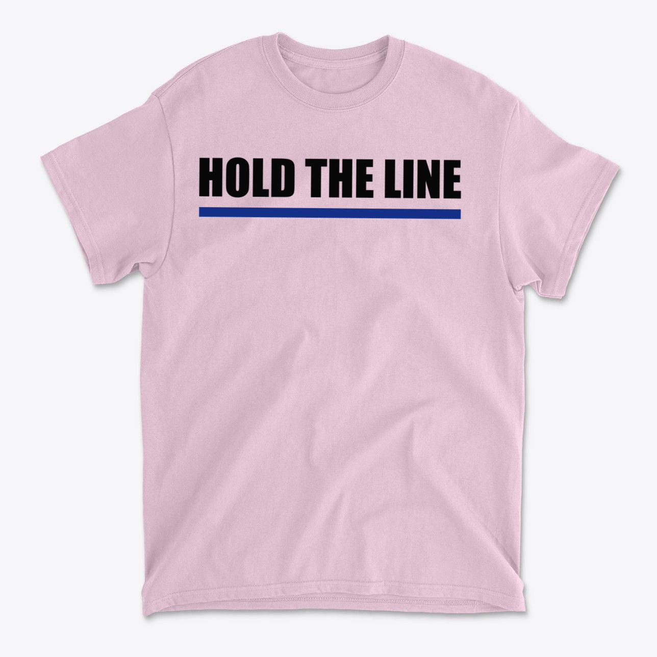 Hold The Line Black Letters T Shirt in pink with bold lettering and blue underline, perfect for a minimalist statement.