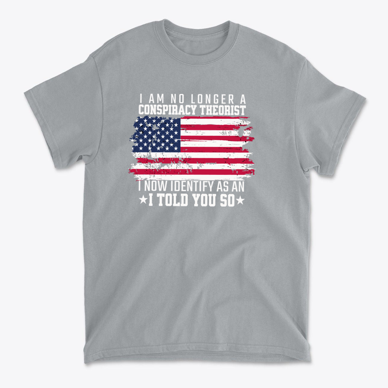 I Am No Longer A Conspiracy Theorist graphic t-shirt featuring a distressed American flag design and bold text.