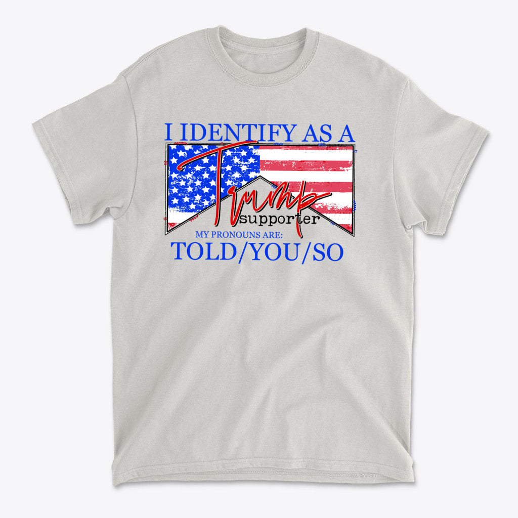 I Identify As A Trump Supporter t-shirt with American flag design and bold text in red and blue.
