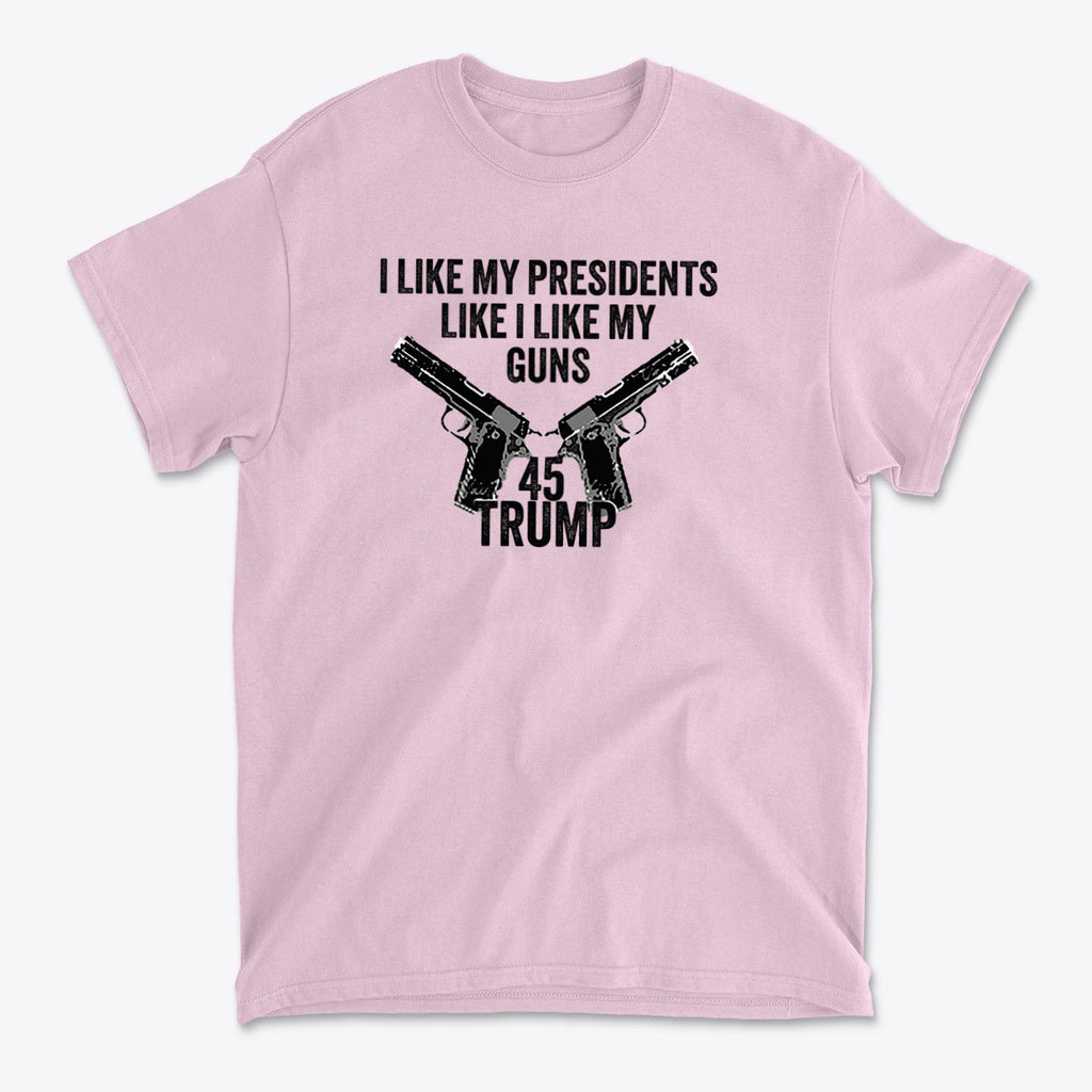 I Like My Presidents Like I Like My Guns 45 Trump graphic on a pink t-shirt featuring two guns.