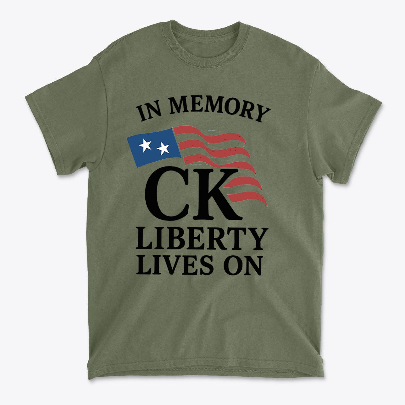 In Memory Of CK Charlie Kirk Liberty Lives On commemorative T-shirt with flag design.