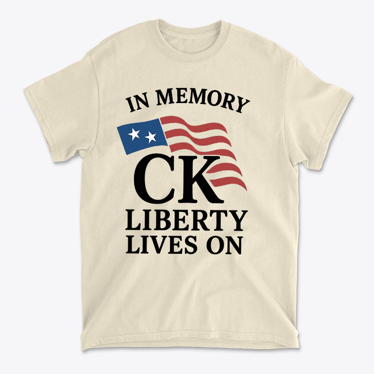 In Memory Of CK Charlie Kirk Liberty Lives On apparel featuring a patriotic design with text and flag elements.