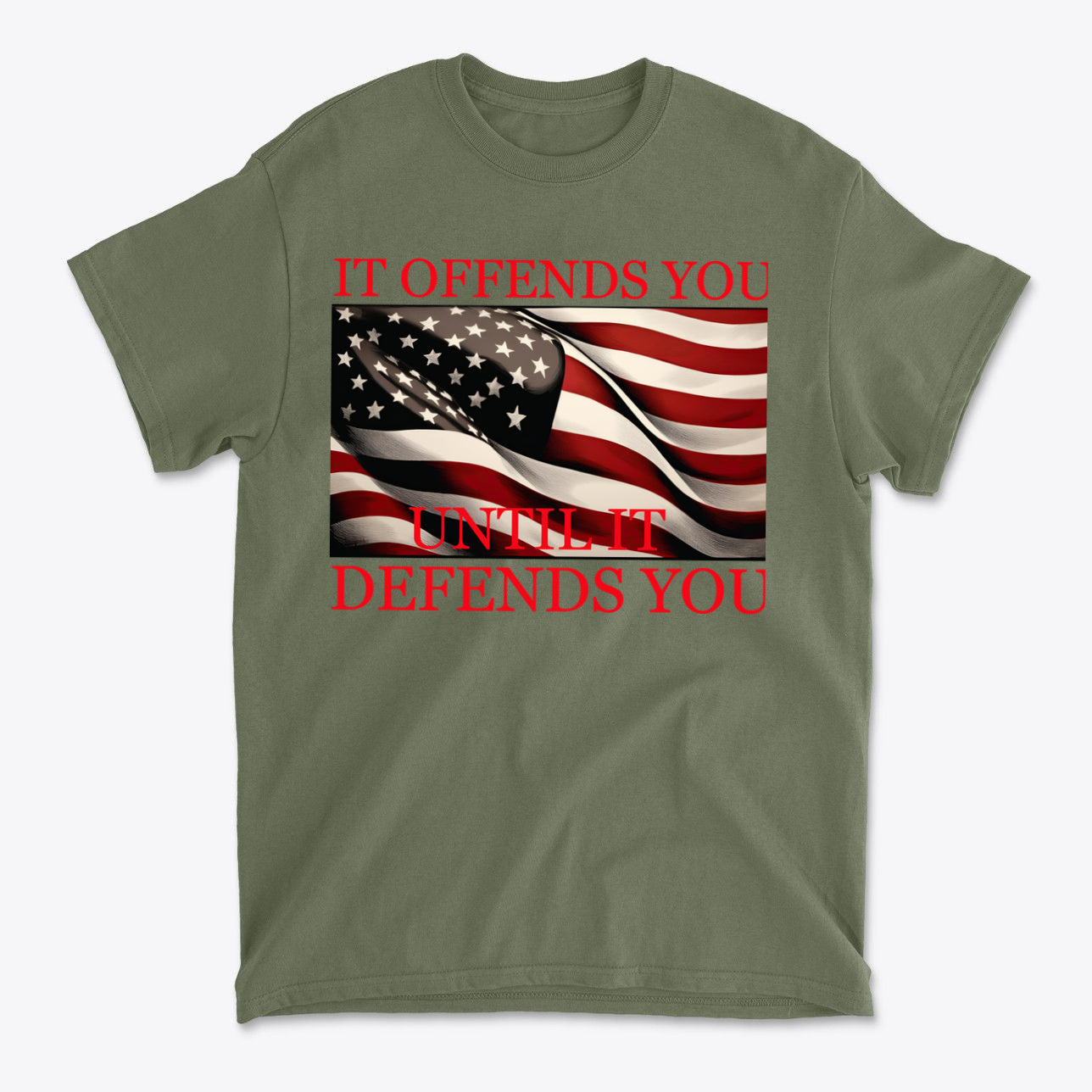 If Offends You Until It Defends You graphic t-shirt featuring American flag design in bold text.