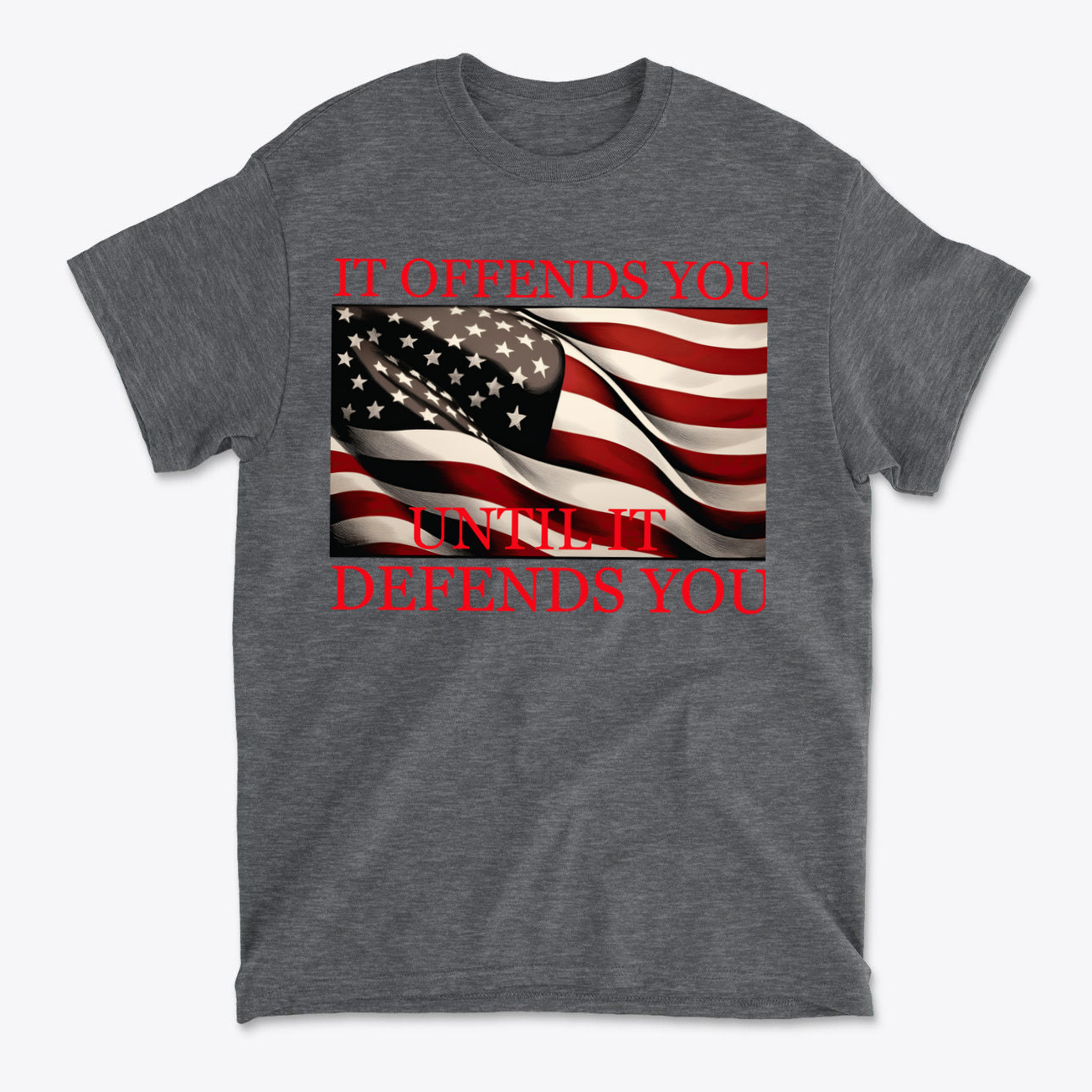If Offends You Until It Defends You graphic t-shirt featuring American flag design on a gray shirt.