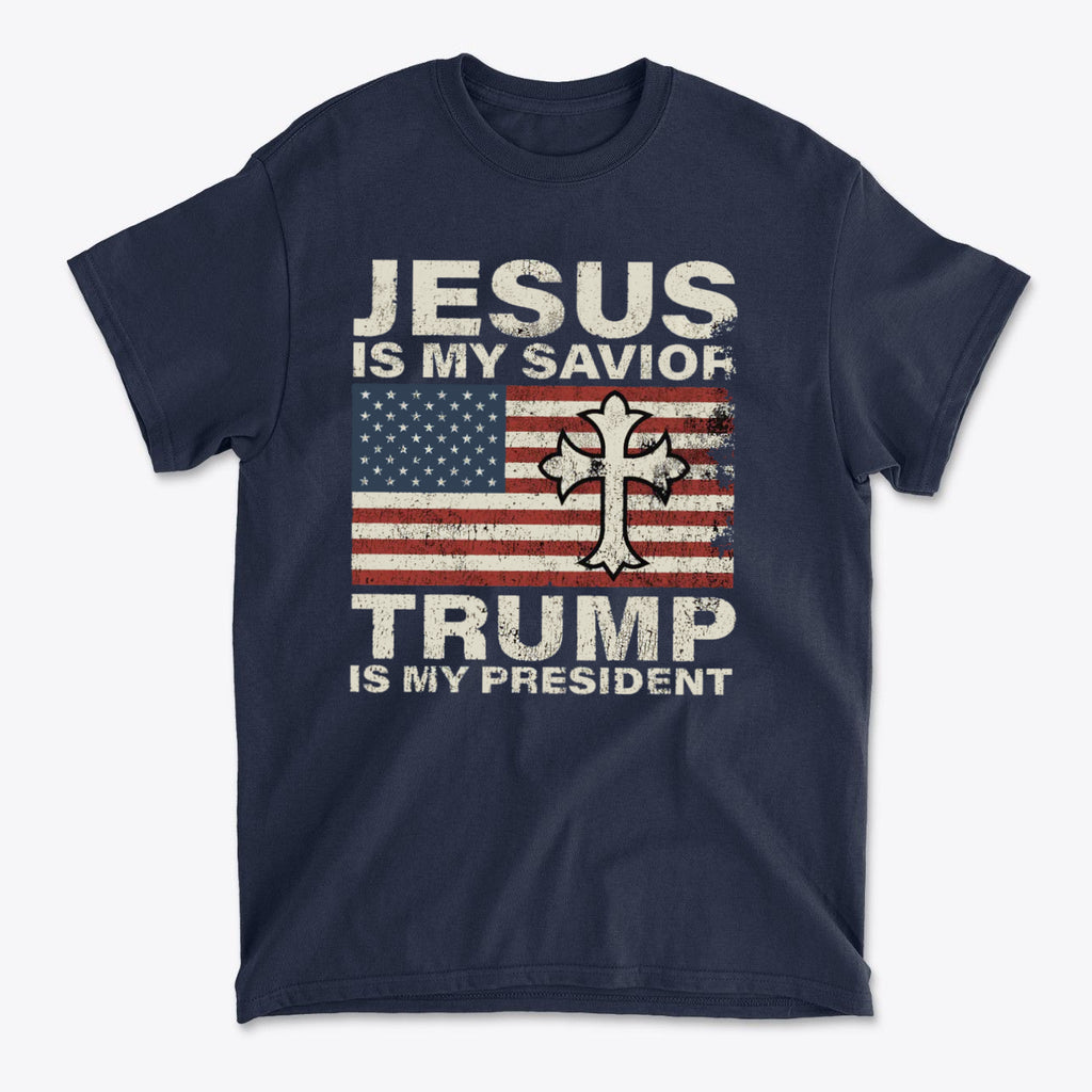 T-shirt featuring text 'Jesus Is My Savior Trump Is My President' with a patriotic design and cross.