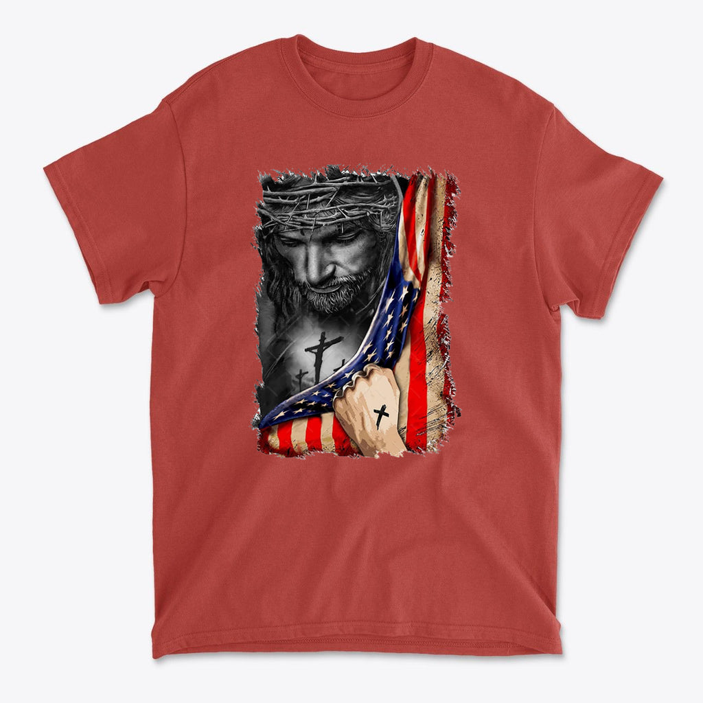 Jesus in American Flag Faith Shirt featuring Jesus holding the American flag with crosses, symbolizing faith and patriotism.