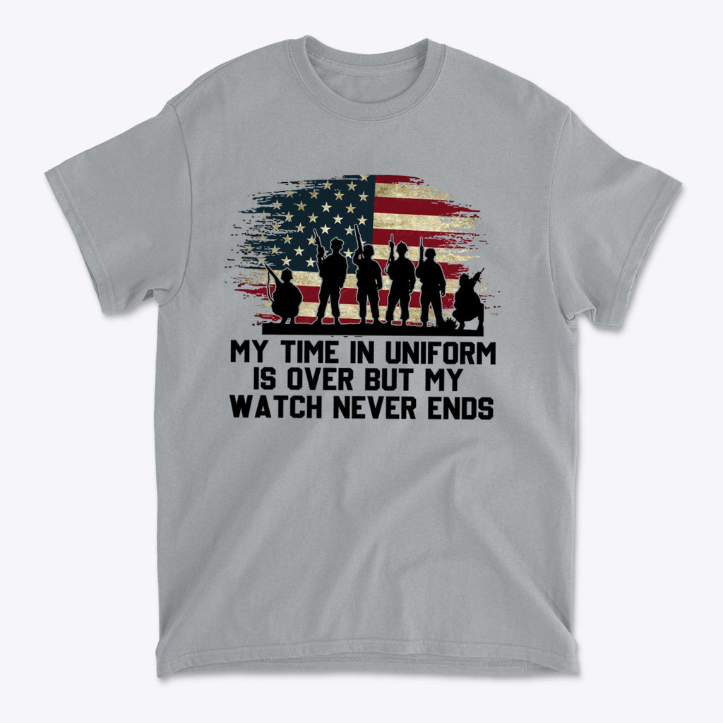 Graphic t-shirt featuring the phrase 'MY TIME IN UNIFORM IS OVER BUT MY WATCH NEVER ENDS' and American flag silhouette.