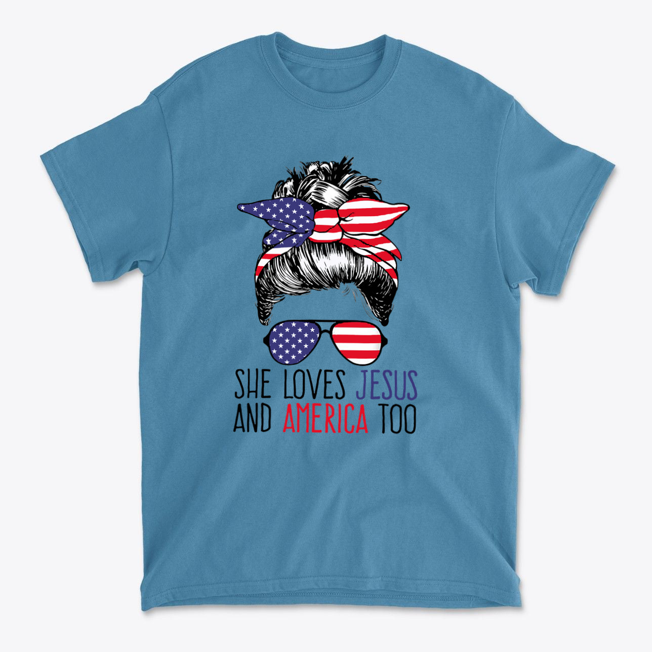 Graphic t-shirt featuring a fun design with the text 'She Loves Jesus And America Too' and American flag motifs.