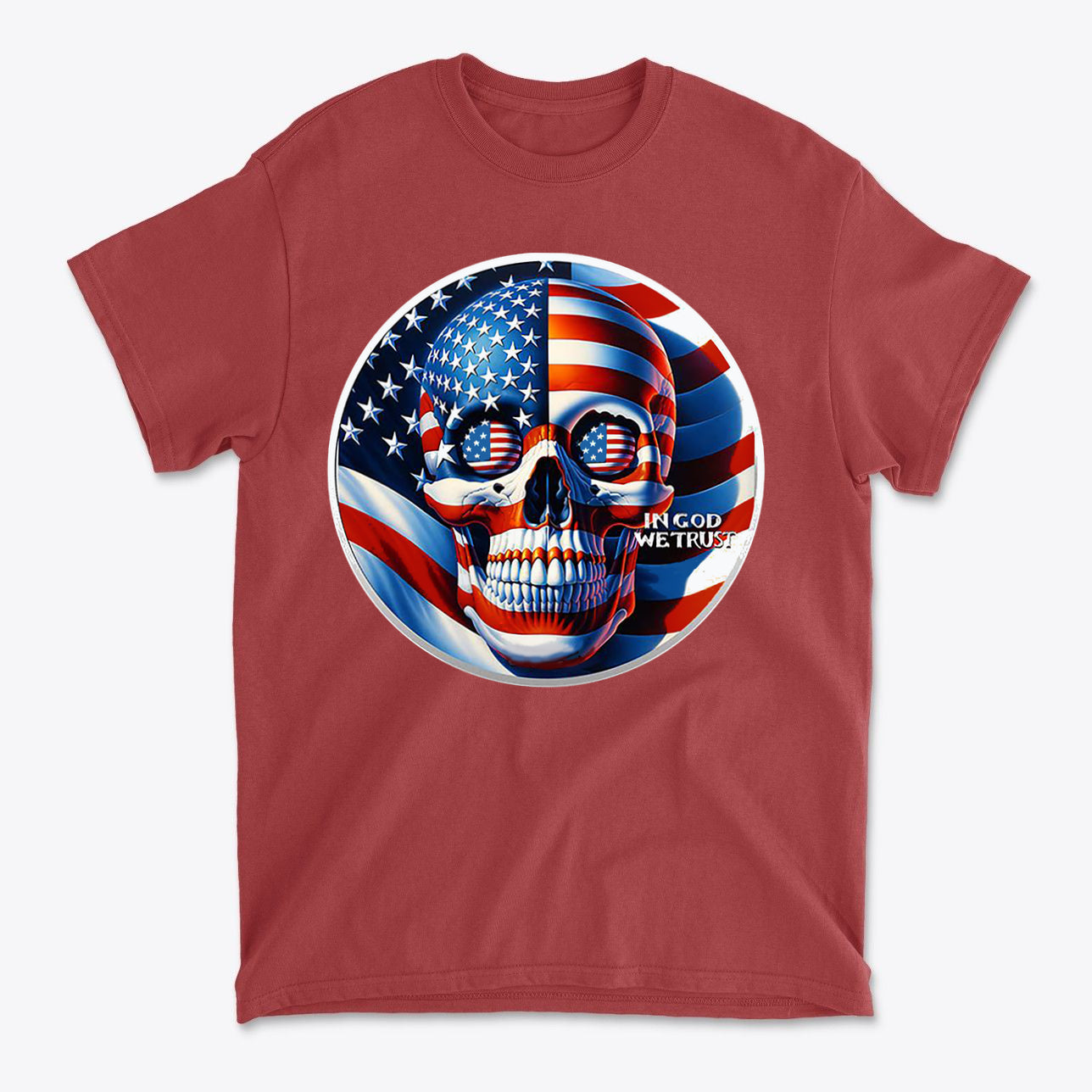 Punisher In Stars And Stripes In God We Trust graphic on a red t-shirt, showcasing patriotic themes.