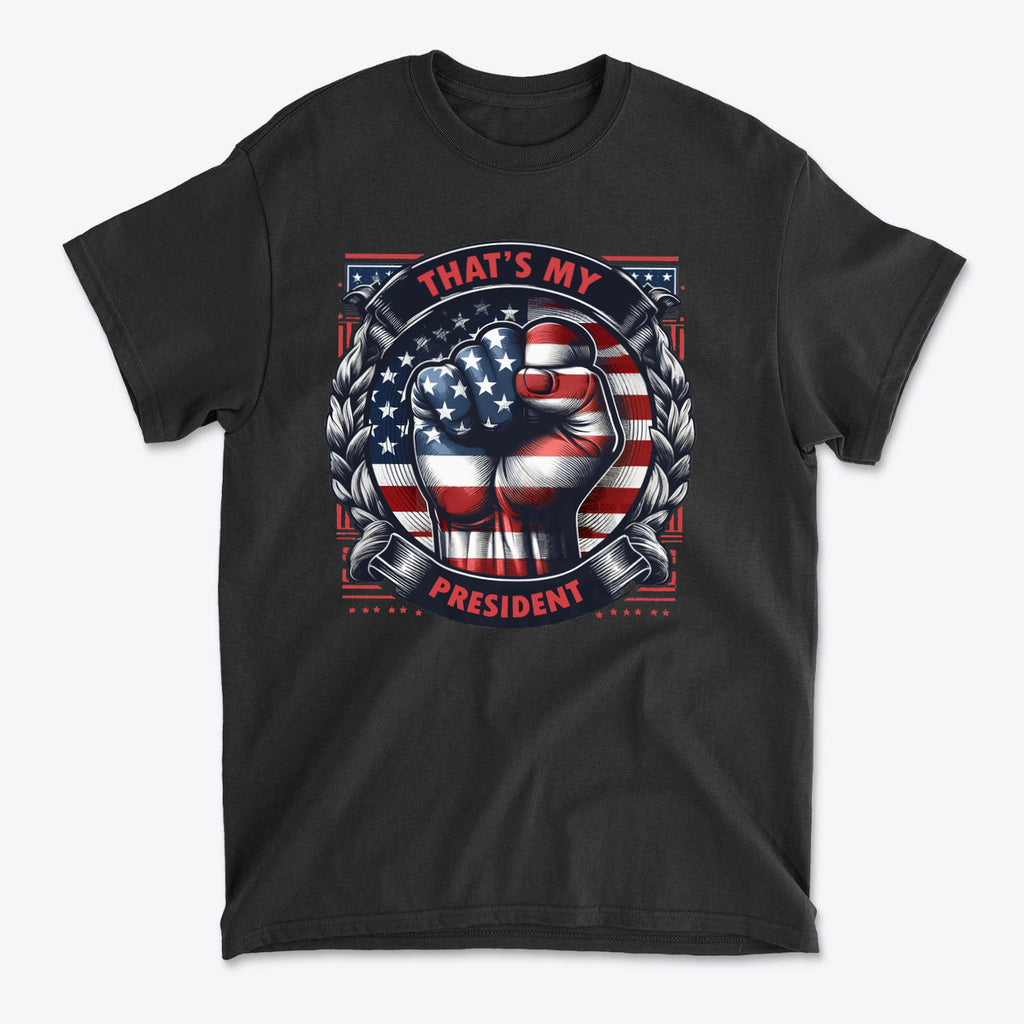 That's My President Fist In Stars And Stripes graphic design on a black t-shirt, symbolizing patriotism and political pride.