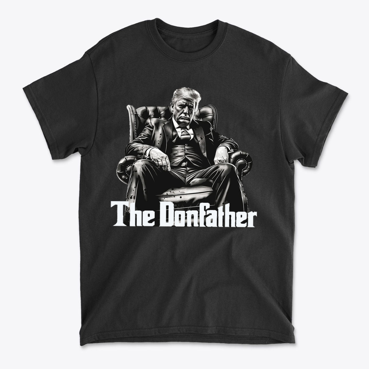 The Donfather Seated Vintage Design t-shirt featuring a stylized portrait of Donald Trump in an office chair.