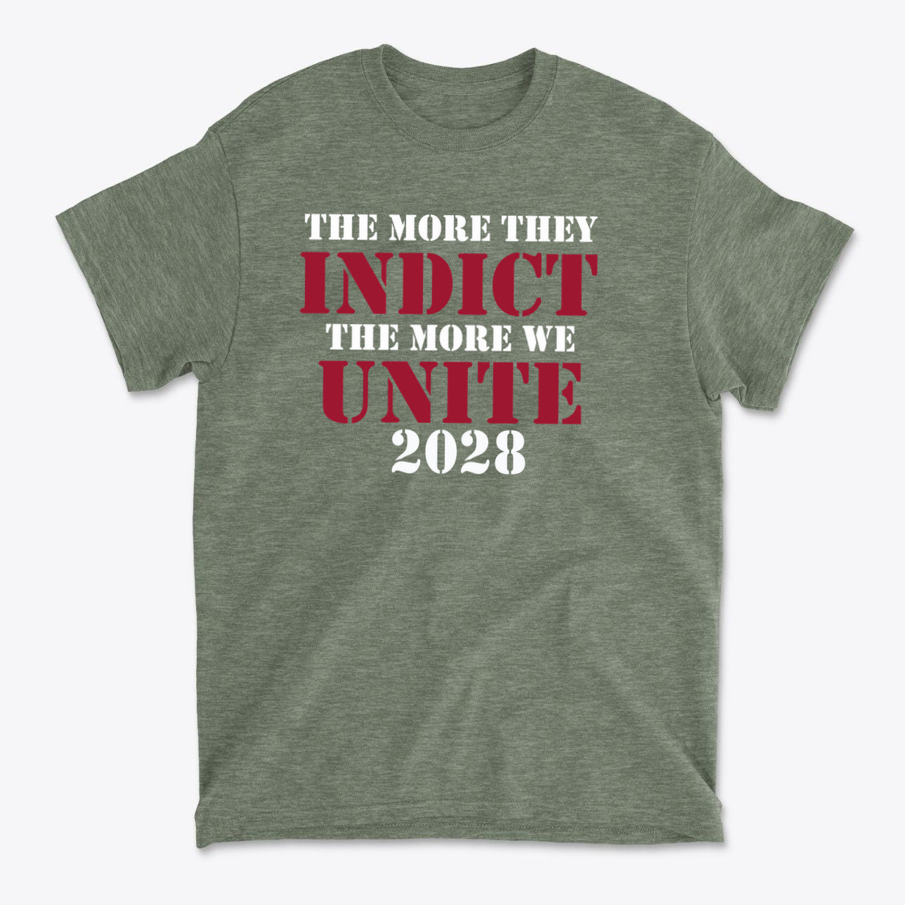 The More They Indict The More We Unite 2028 Wht Ltrs design on a green t-shirt, showcasing a powerful political statement.