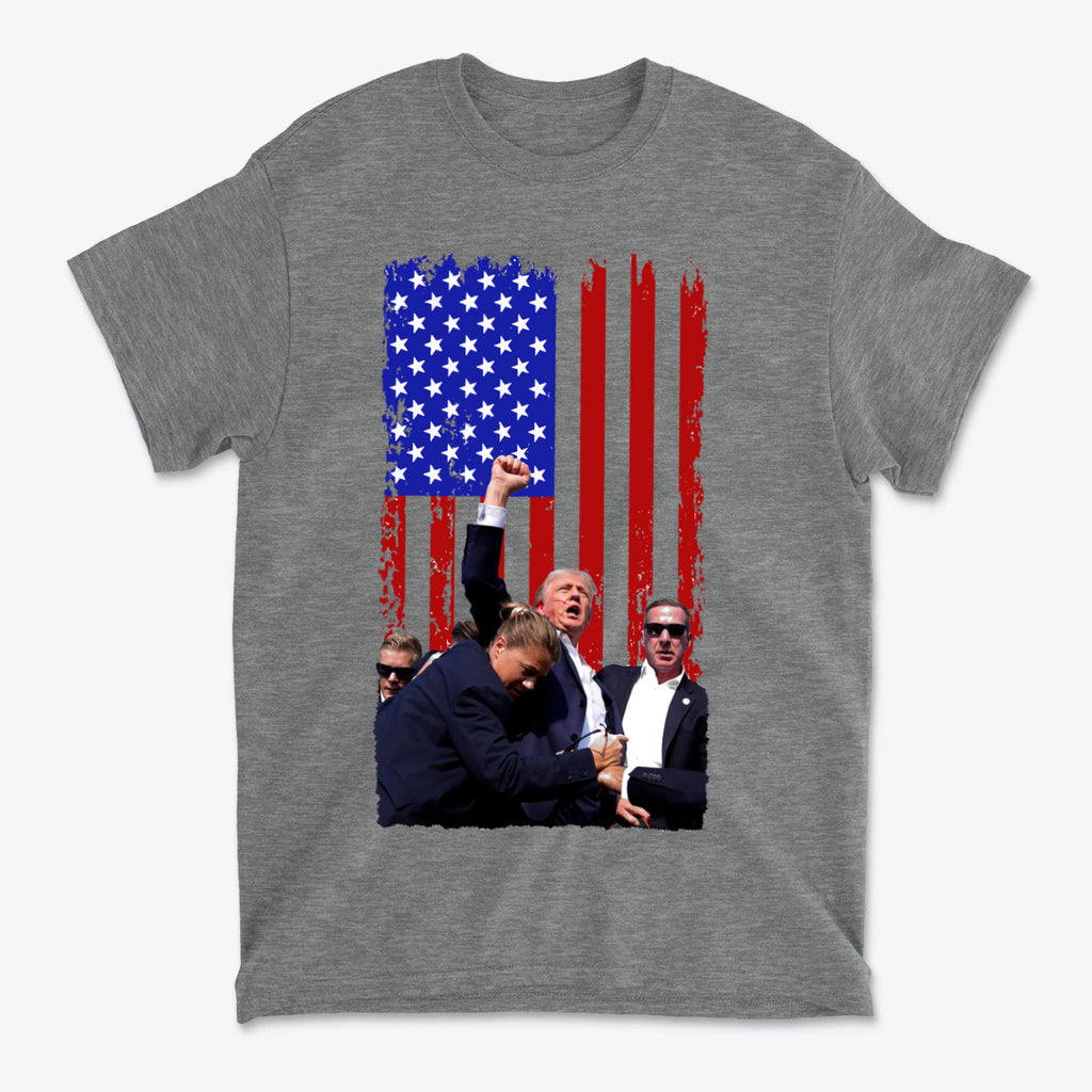 Trump Shot American Flag Design featuring a patriotic graphic of Trump against a distressed American flag background.
