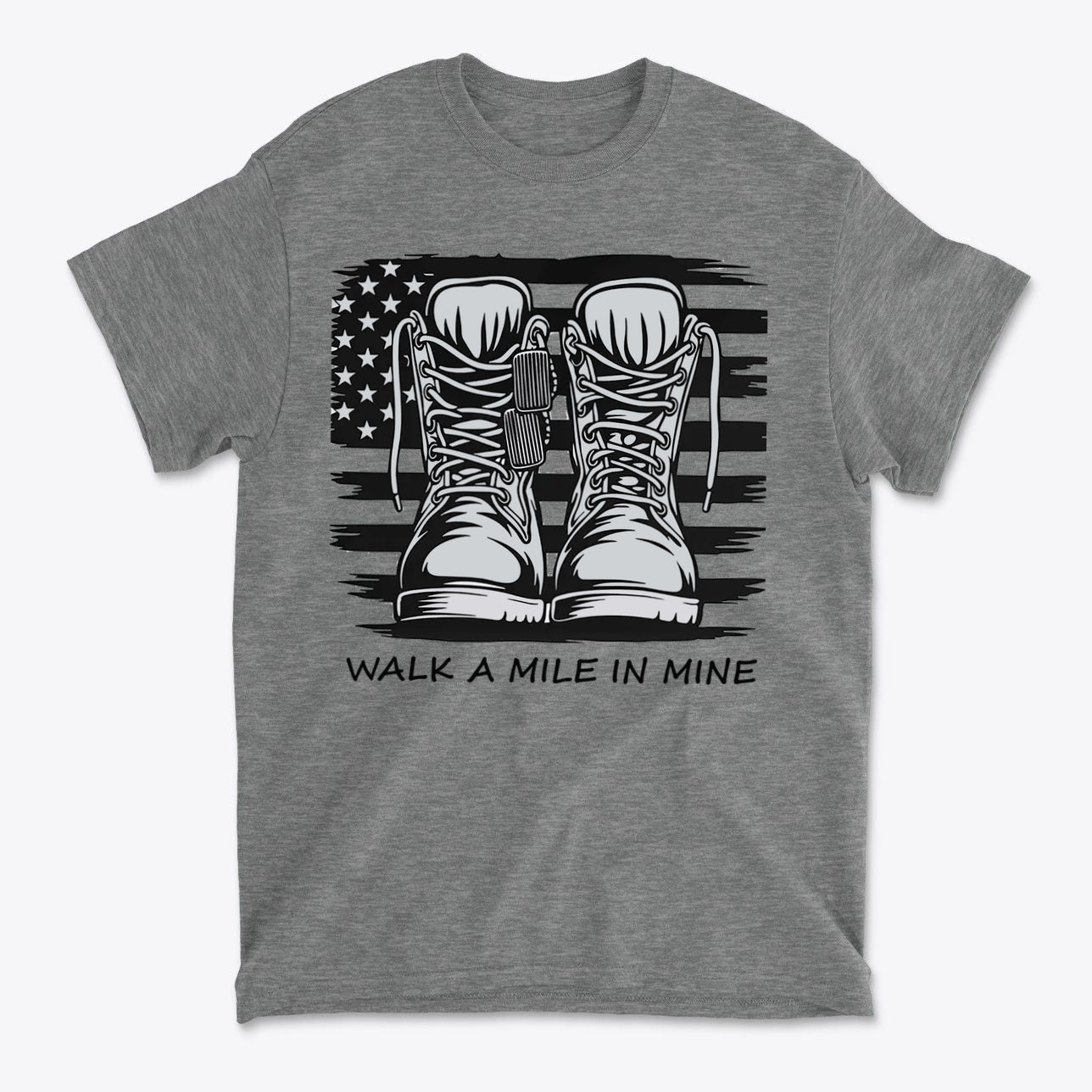 Walk A Mile In Mine Apparel Art featuring military boots on a gray shirt with an American flag background.