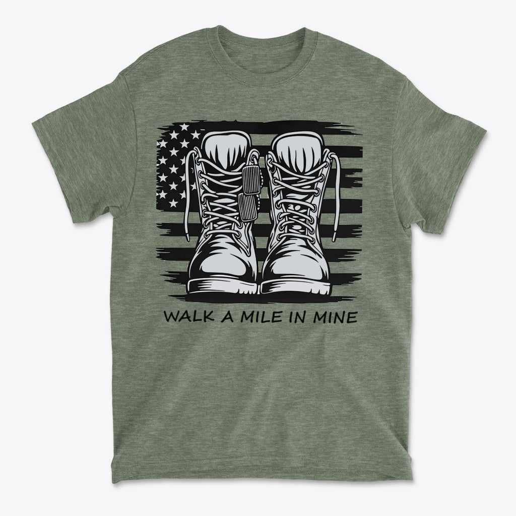 Walk A Mile In Mine Apparel Art with combat boots and American flag design on a green shirt.