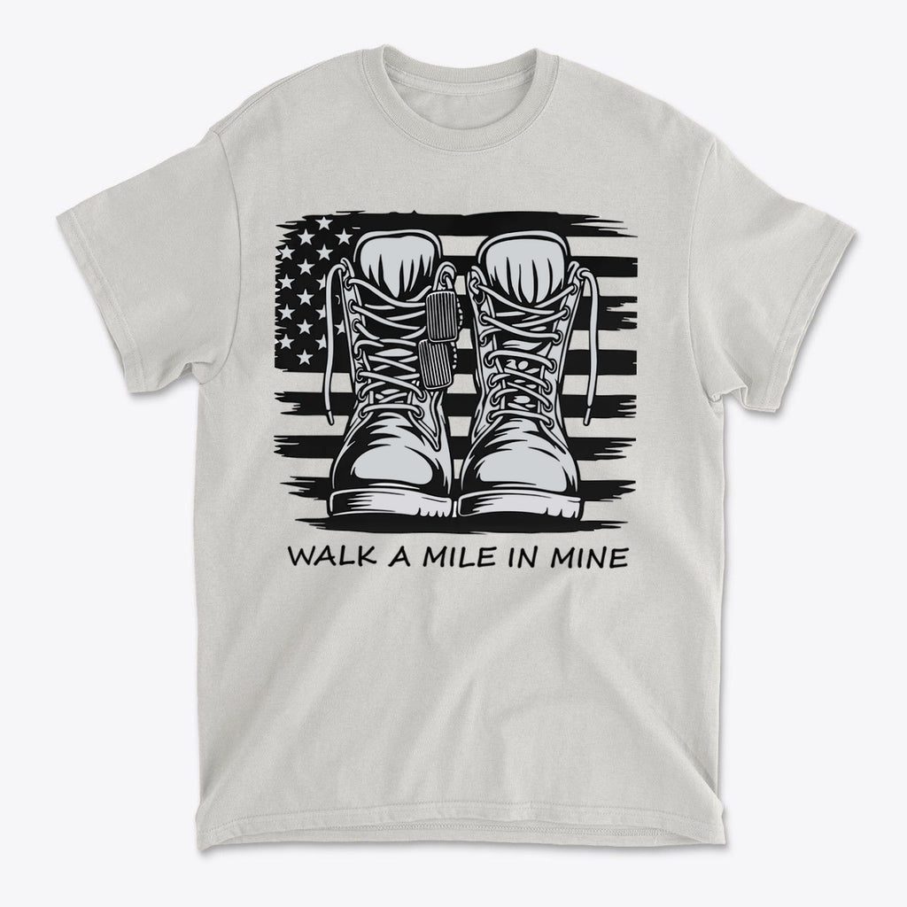 Walk A Mile In Mine Apparel Art t-shirt with boots design and American flag background
