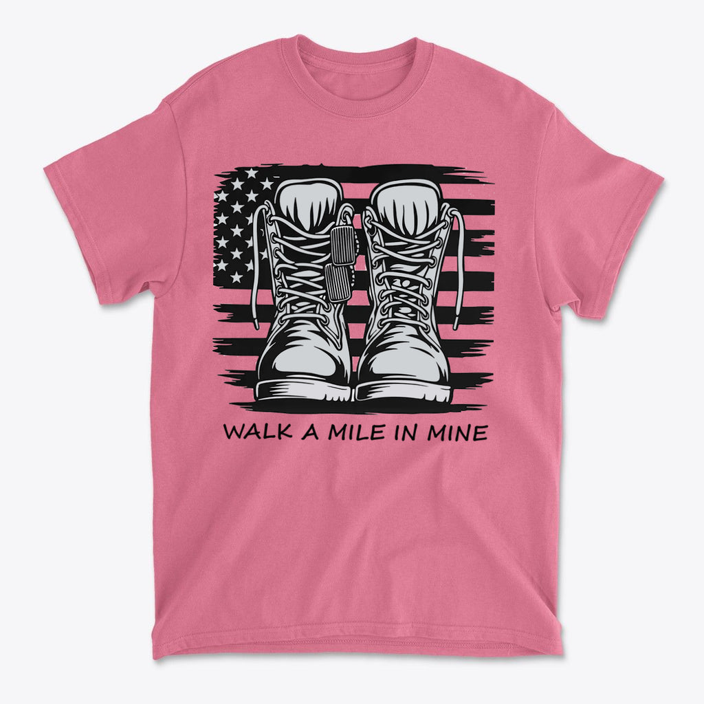 Walk A Mile In Mine Apparel Art featuring military boots over an American flag design on a pink t-shirt.