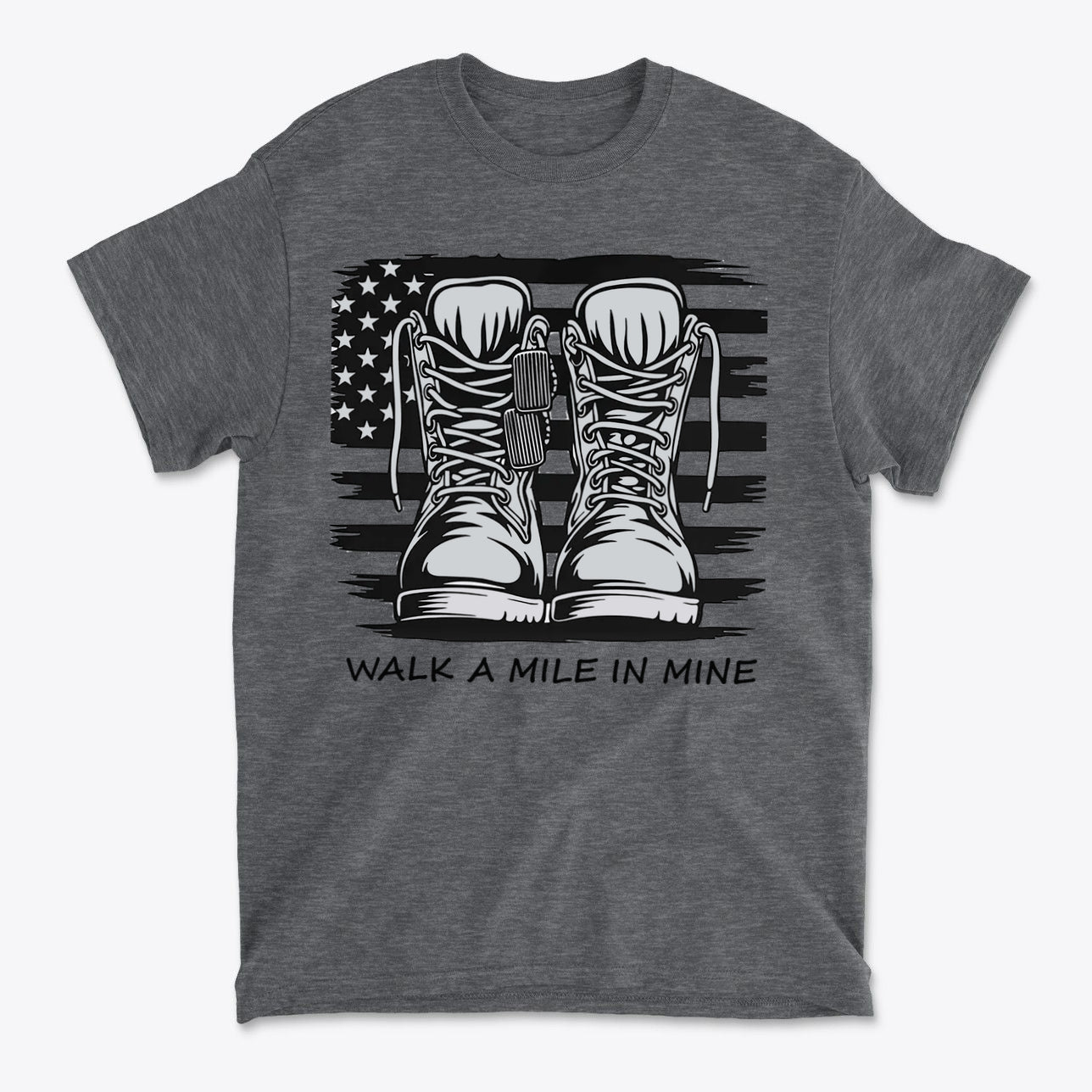 Walk A Mile In Mine Apparel Art featuring combat boots on a gray t-shirt with American flag background.