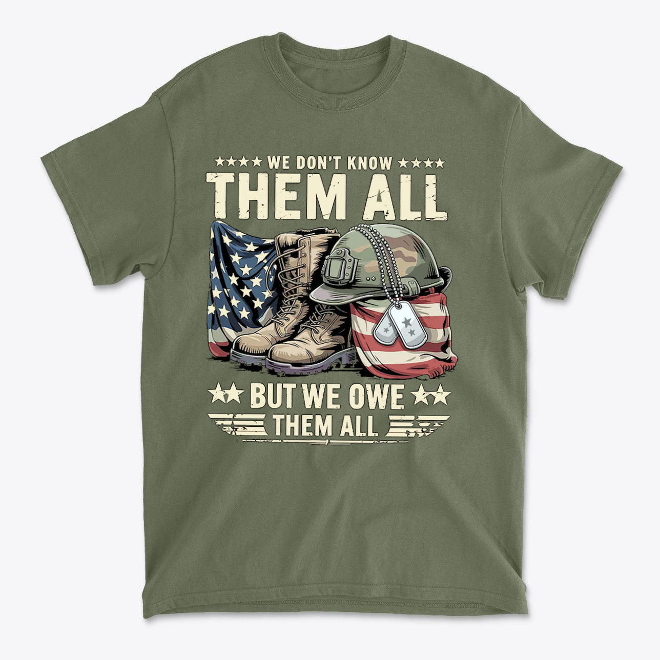 We Don't Know Them All But We Owe Them All graphic t-shirt featuring military boots, helmet, and American flag.