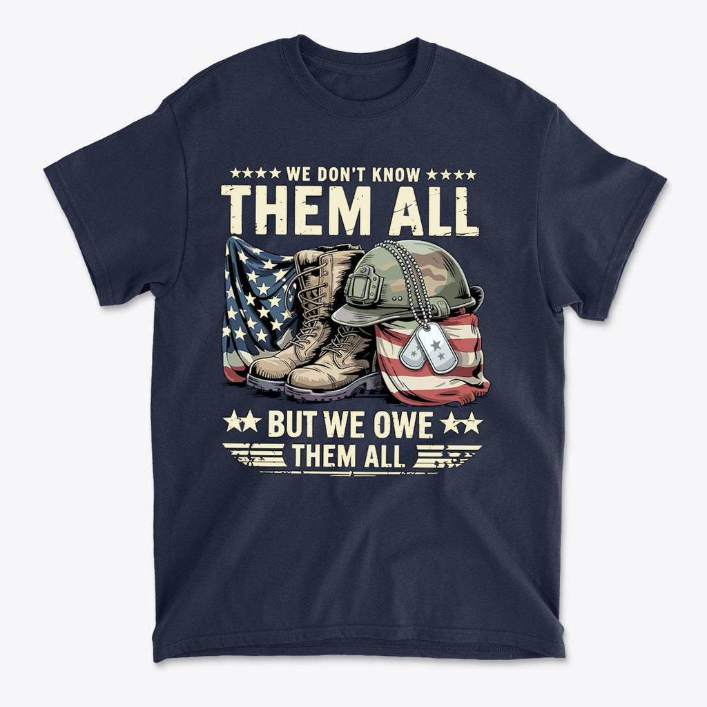 We Don't Know Them All But We Owe Them All t-shirt design featuring military boots, helmet, and American flag.