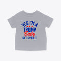 Trump Baby Get Over It Kids Tee featuring bold lettering in blue and red.