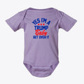 Yes I am A Trump Baby Bodysuit Art in lavender with playful text, perfect for patriotic infants.