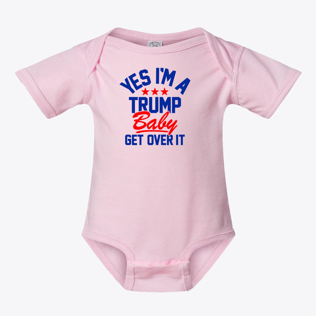 Yes I am A Trump Baby Bodysuit Art in pink with bold text and stars design, promoting patriotic values.