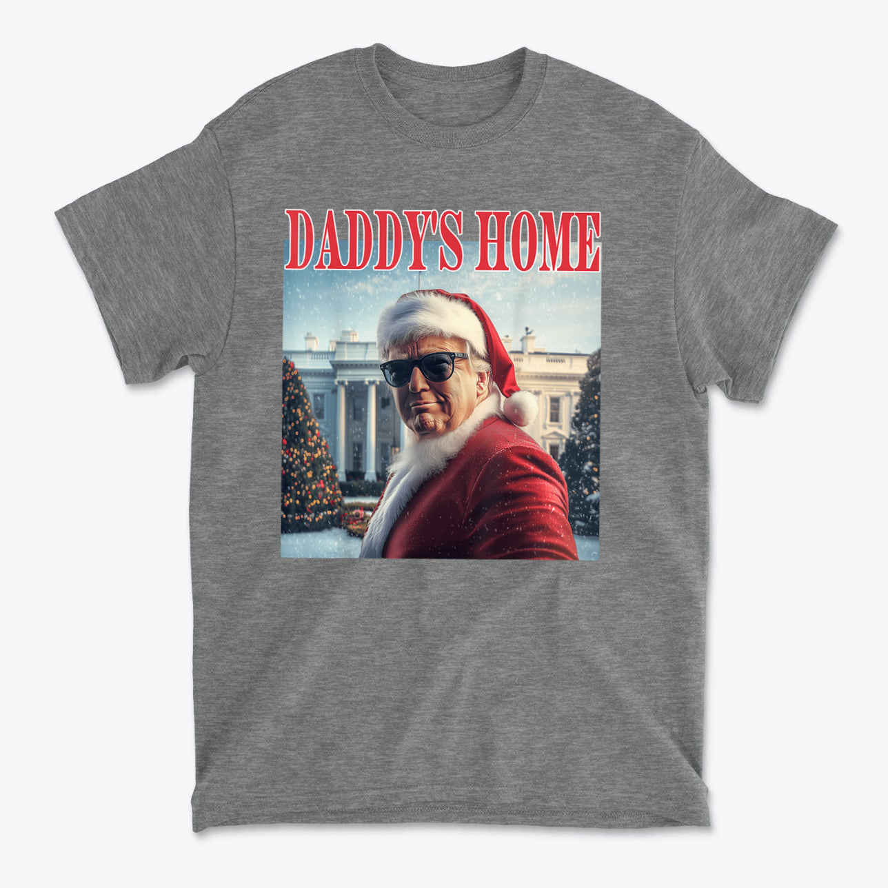 Daddy is Home Trump As Santa Tee featuring a graphic of Trump in Santa attire with the White House backdrop.