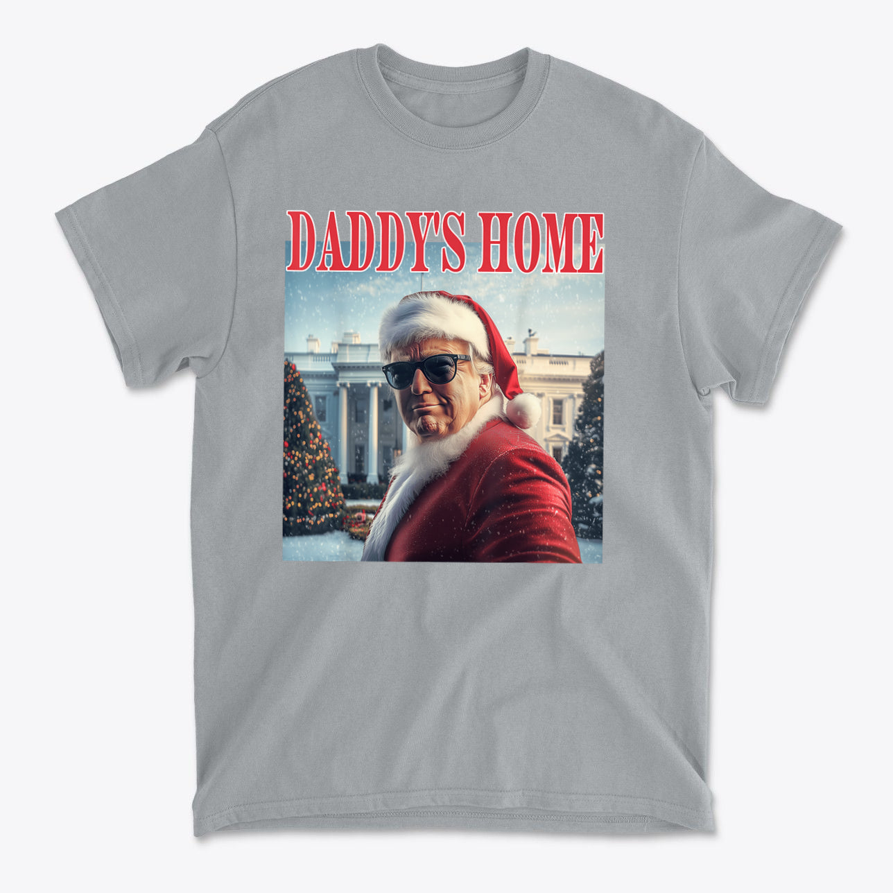 Daddy is Home Trump As Santa Tee featuring a Santa figure outside the White House with sunglasses.