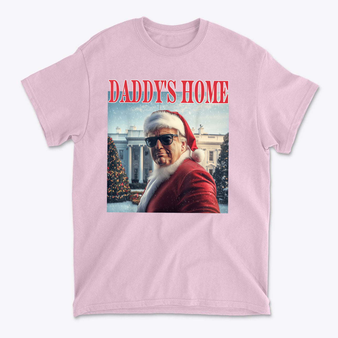 Daddy is Home Trump As Santa Tee in pink with Santa design and White House backdrop.