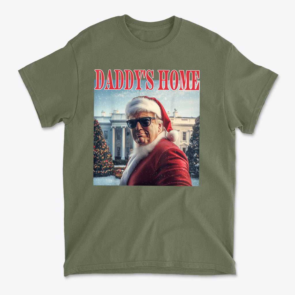 Daddy is Home Trump As Santa Tee featuring a figure in Santa attire with sunglasses in front of the White House.