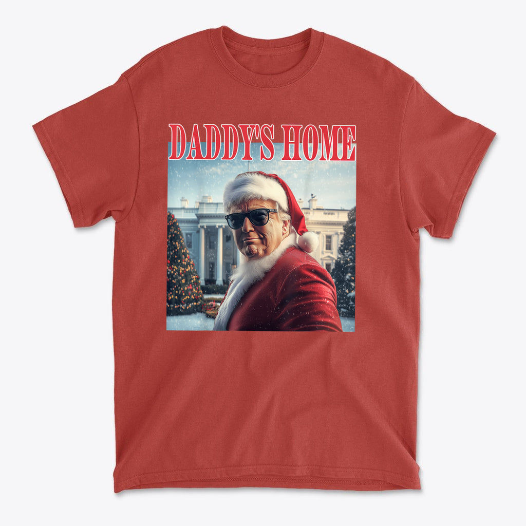 Daddy is Home Trump As Santa Tee featuring a festive design with sunglasses and holiday backdrop.