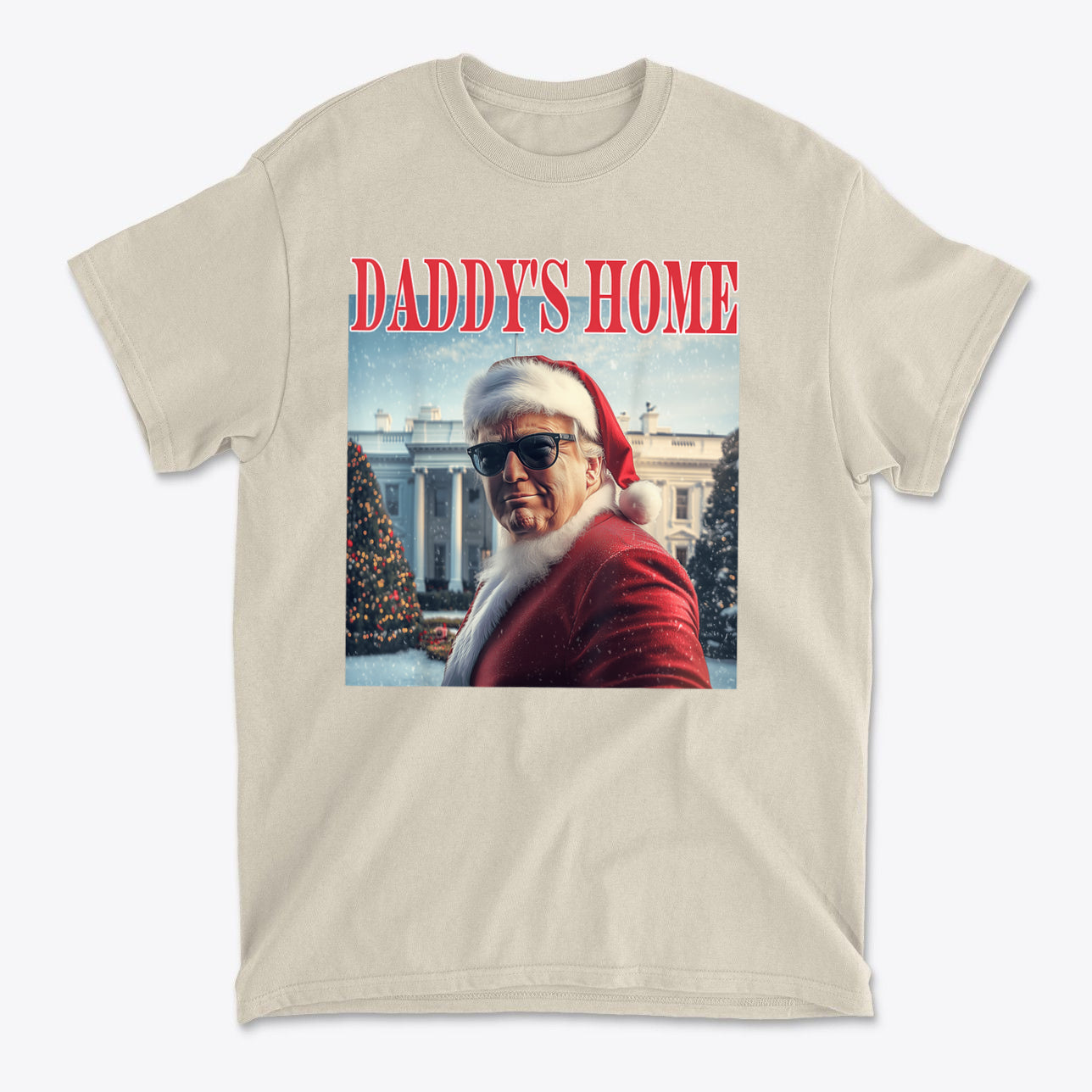 Daddy is Home Trump As Santa Tee featuring a man in Santa suit and sunglasses in front of the White House.