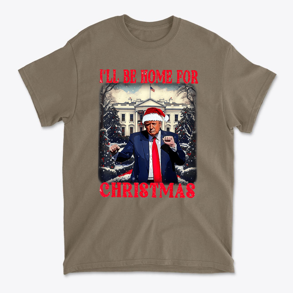 Trump Dancing I'll Be Home For Christmas graphic t-shirt featuring a festive design with Santa hat.