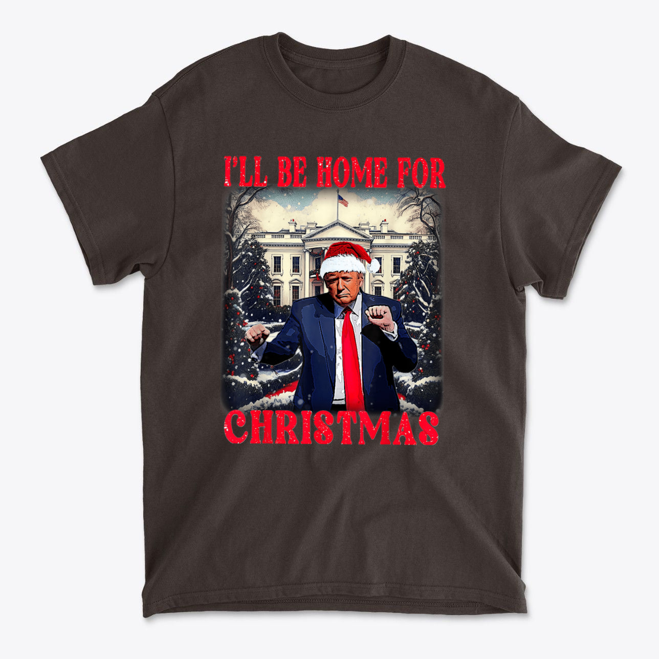 Trump Dancing Be Home For Christmas Graphic Tee featuring Trump in a Santa hat dancing in front of the White House.