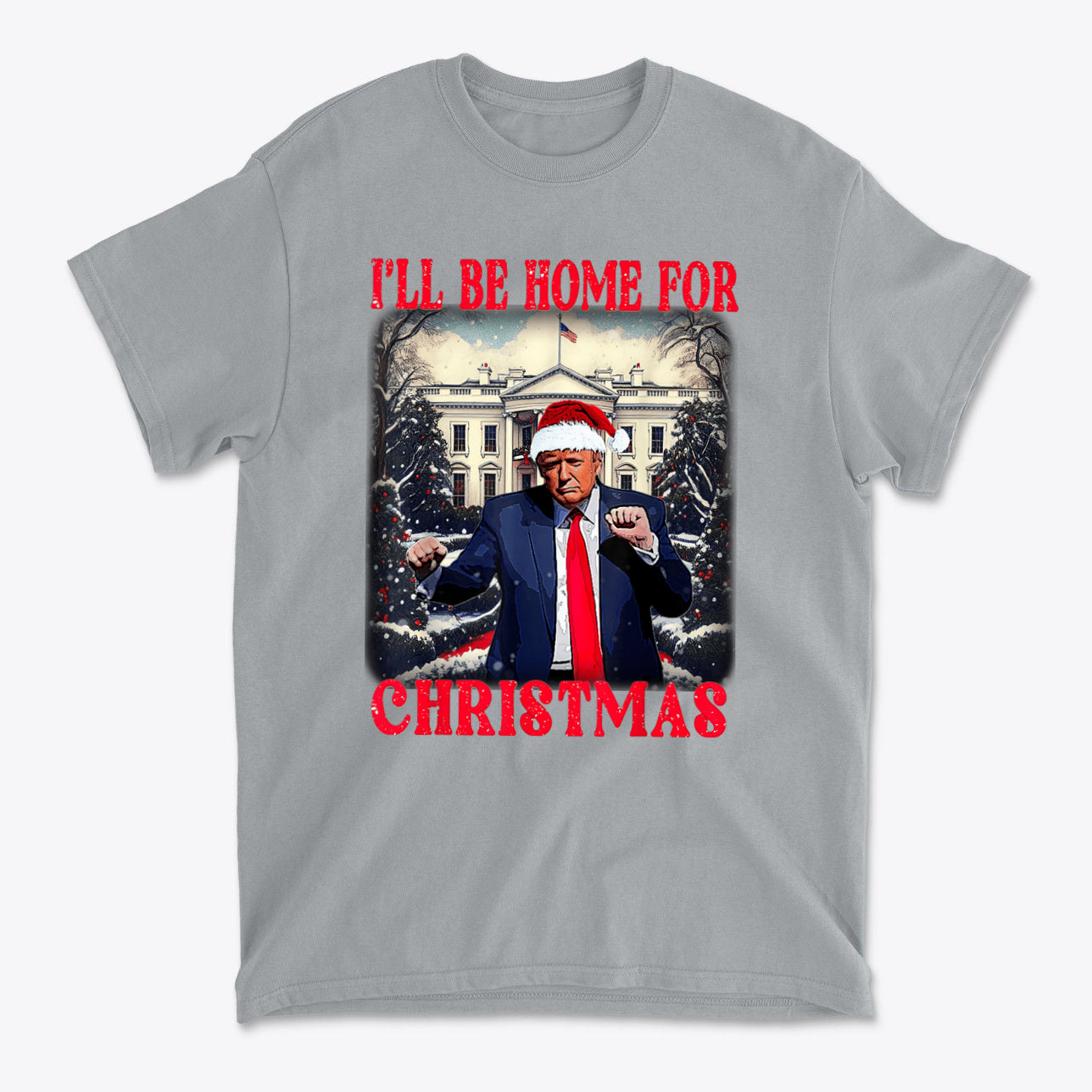 Trump Dancing Be Home For Christmas Graphic Tee featuring Trump in a Santa hat, perfect for festive celebrations.