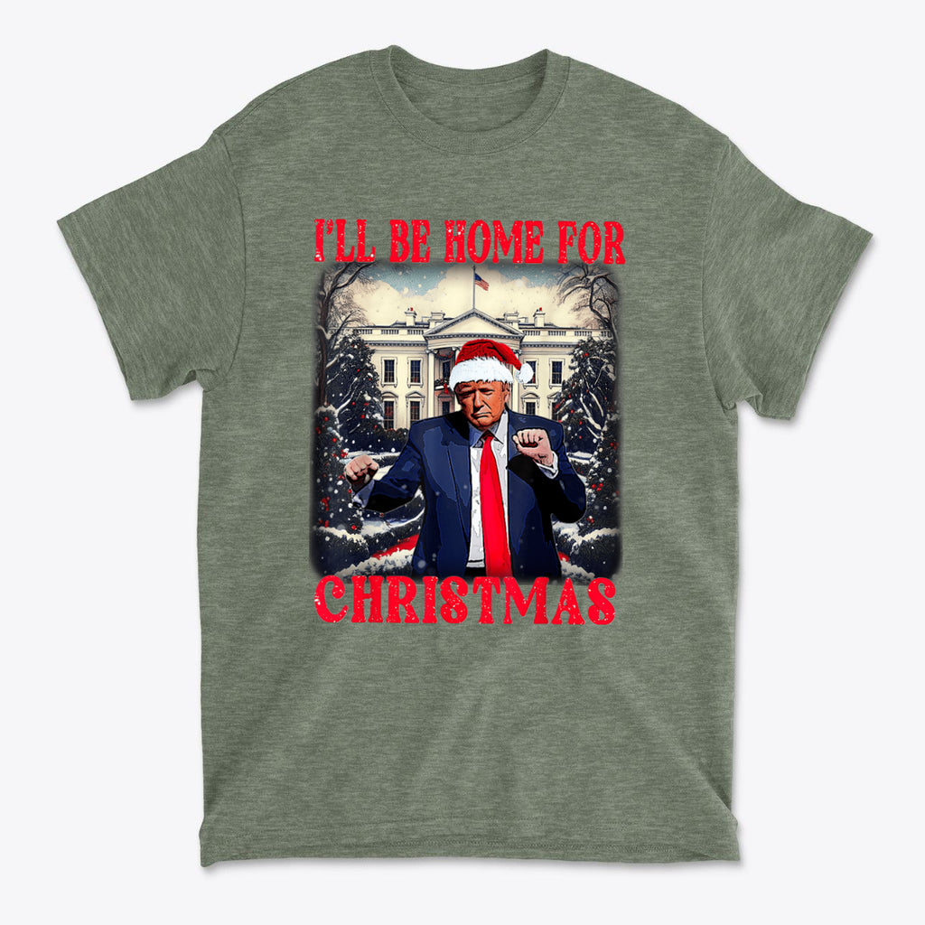 Trump Dancing Be Home For Christmas Graphic Tee featuring Trump in a Santa hat, festive design.