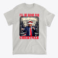 Trump Dancing Be Home For Christmas Graphic Tee featuring a dancing Trump in a Santa hat.