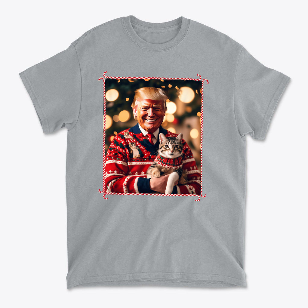 Trump Christmas Sweater For Cat Lovers featuring a smiling man in a festive sweater holding a cat.
