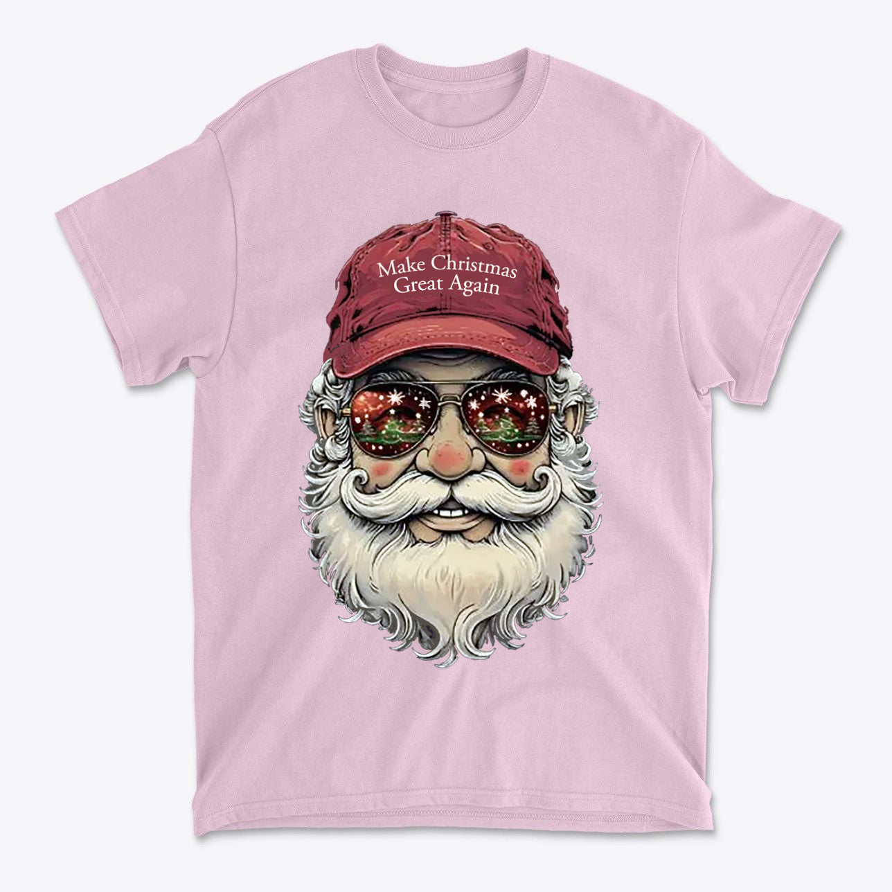 Make Christmas Great Again Santa With MAGA Hat graphic on a pink t-shirt featuring a Santa with sunglasses.