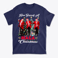 Have Yourself A MAGA Christmas graphic t-shirt featuring three festive figures by a Christmas tree.