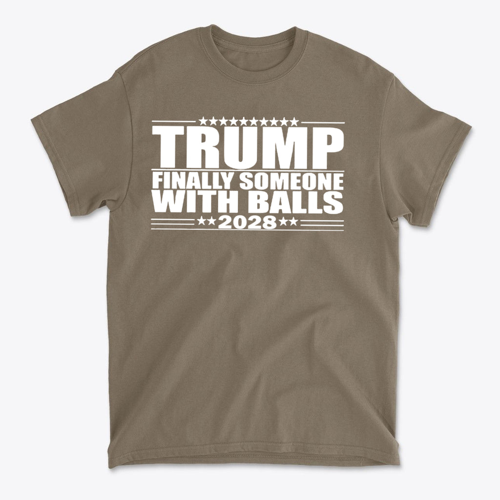 Trump 2028 Finally Someone With Balls premium graphic t-shirt in olive color showcasing patriotic message.