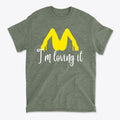 I’m Loving It Fun Casual Graphic T-Shirt Design featuring a playful graphic in yellow on a gray tee.