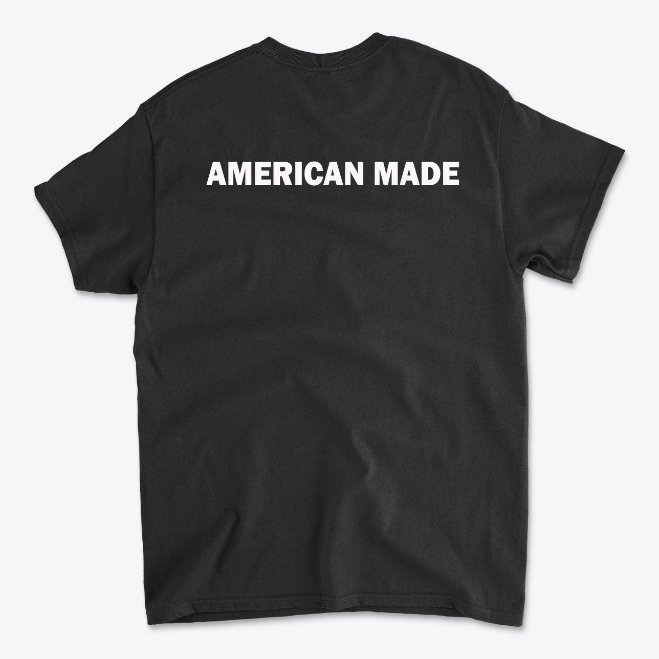 Back view of a black t-shirt featuring the text 'AMERICAN MADE', emphasizing Authentic American Made Apparel.