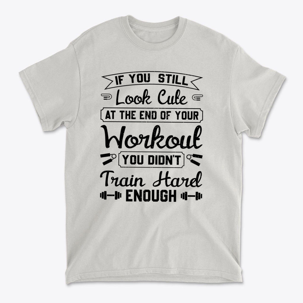 Train Hard Not Looking Cute Now motivational workout t-shirt design with bold text on a light grey background.