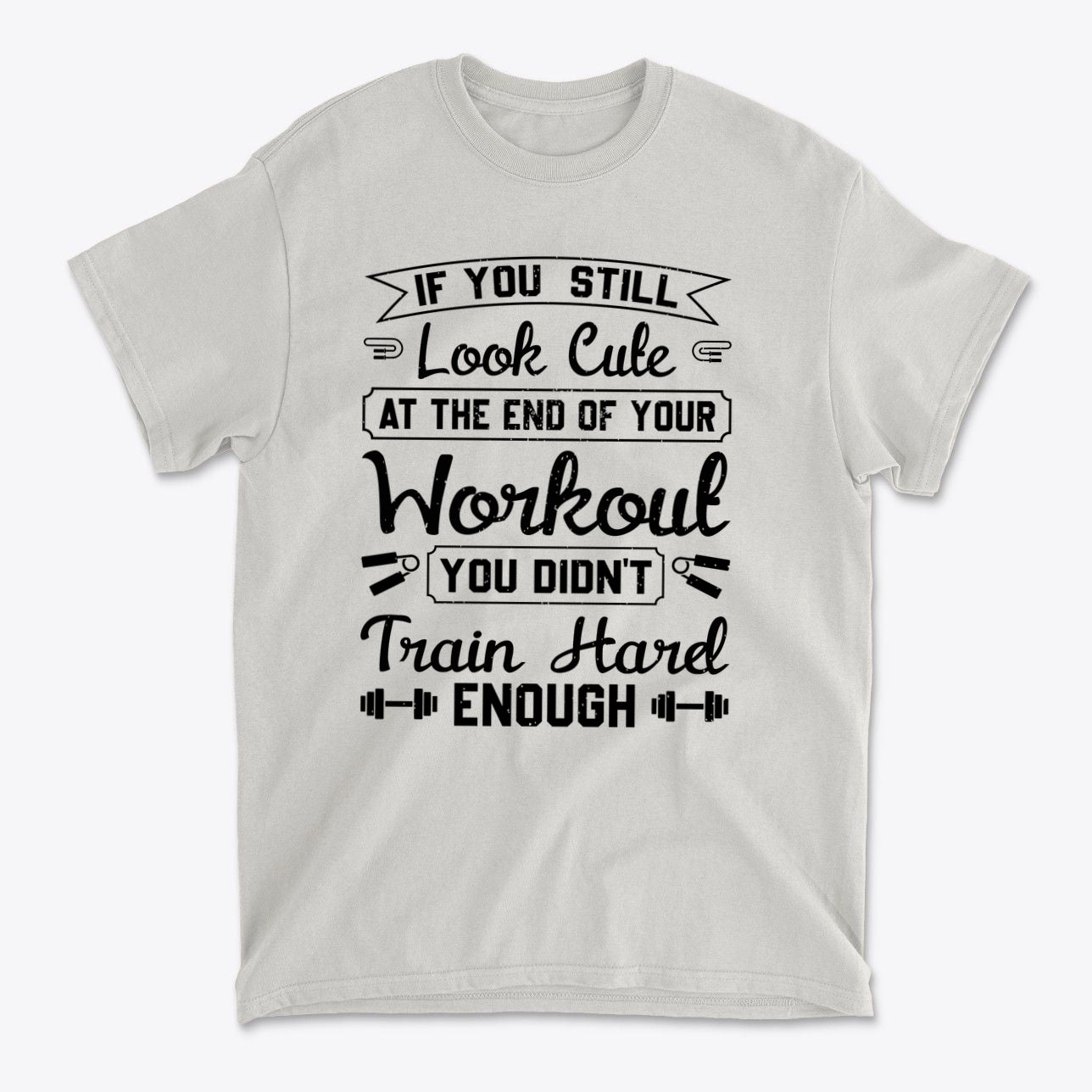 Train Hard Not Looking Cute Now motivational workout t-shirt design with bold text on a light grey background.