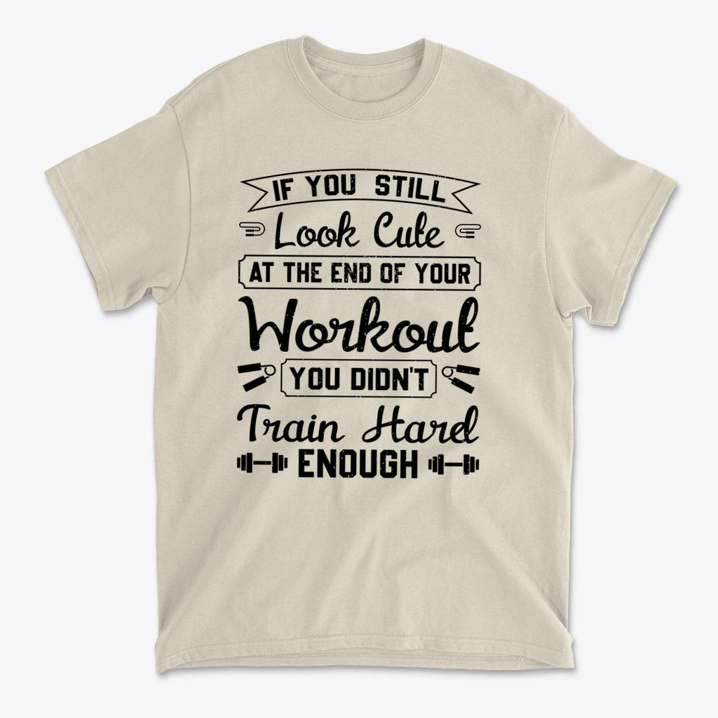 Train Hard Not Looking Cute Now shirt with motivational fitness quote on light background.
